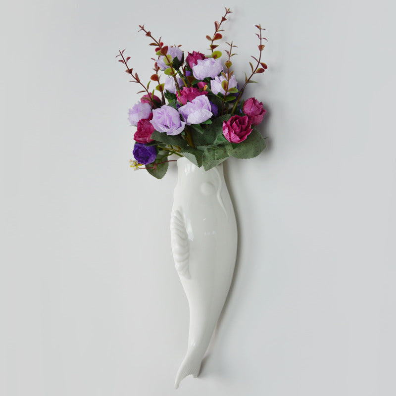 White ceramic fish wall vases, view 2