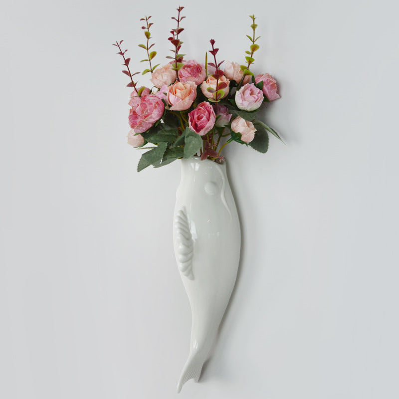 White ceramic fish wall vases, view 3