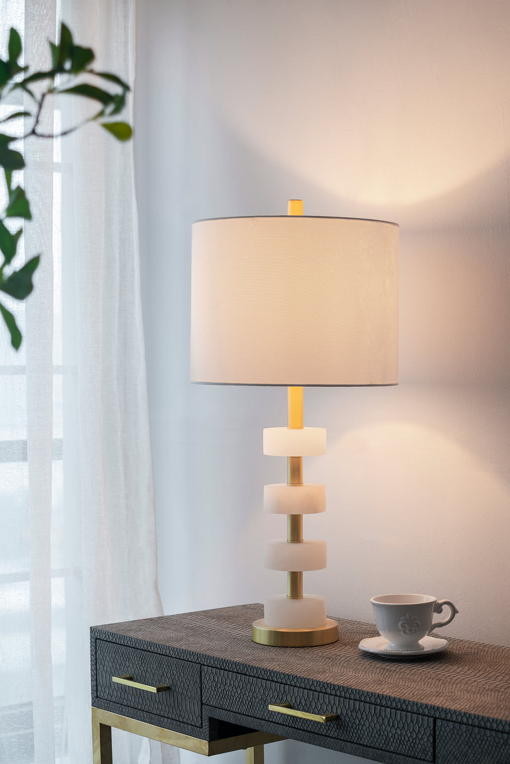 White marble table lamp with gold accents, 26 inches