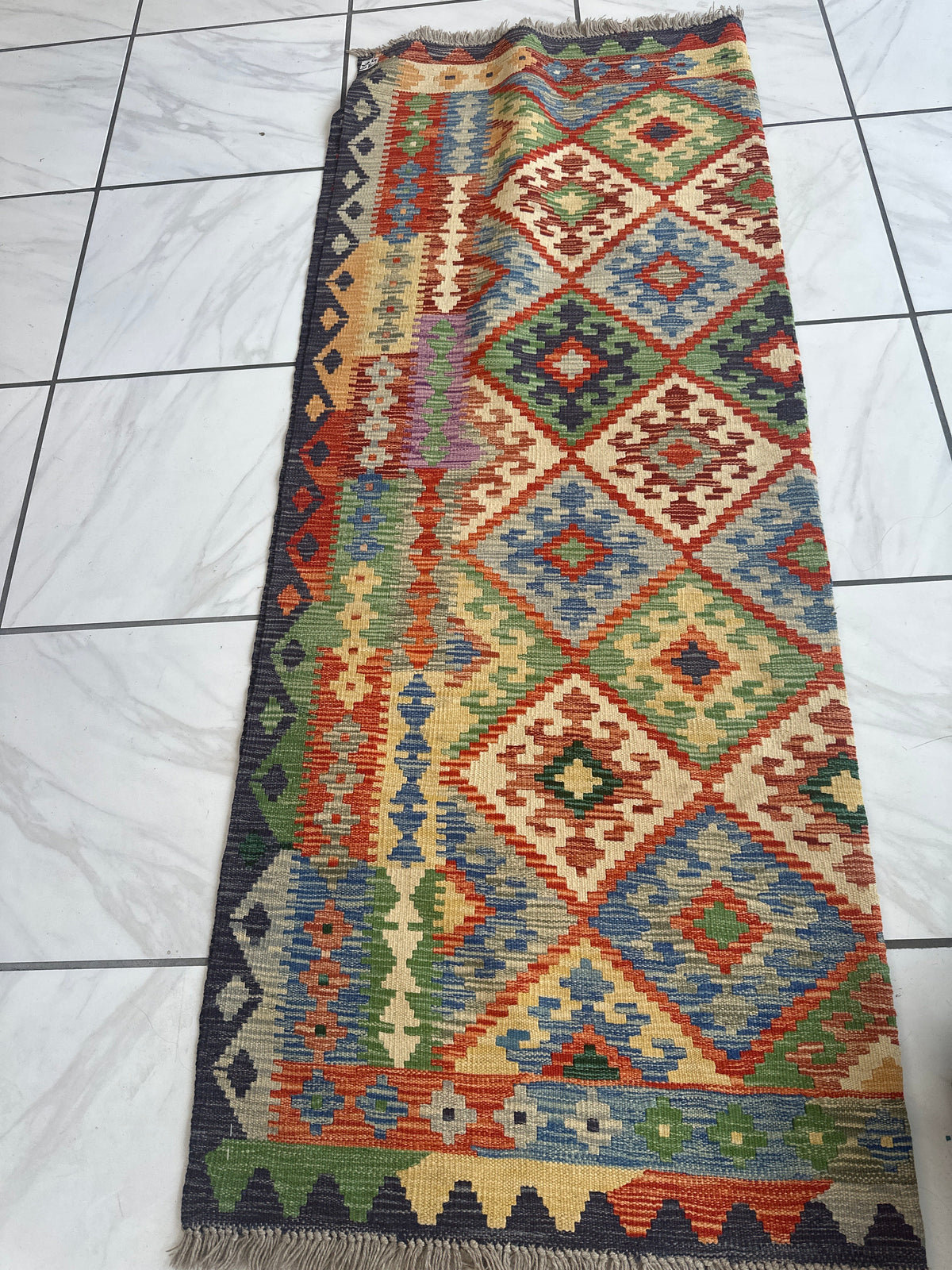 Afghan wool kilim rug with red, green and cream diamonds