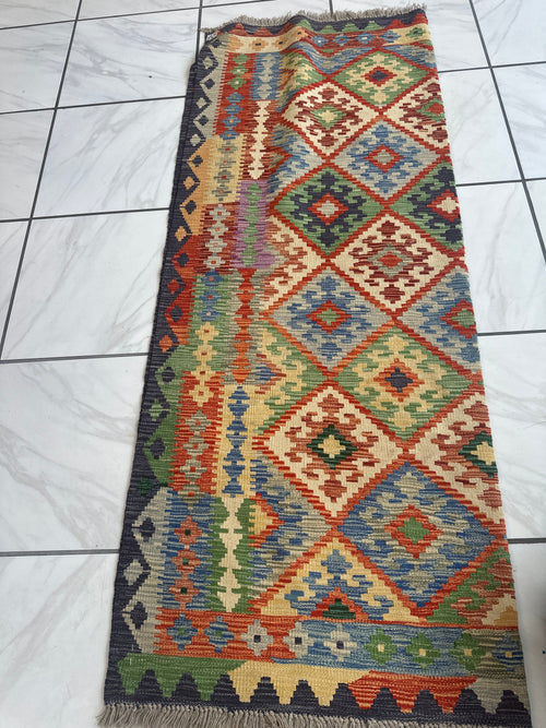 Afghan wool kilim rug with red, green and cream diamonds