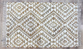 Kilim-style handwoven jute and wool rug in beige