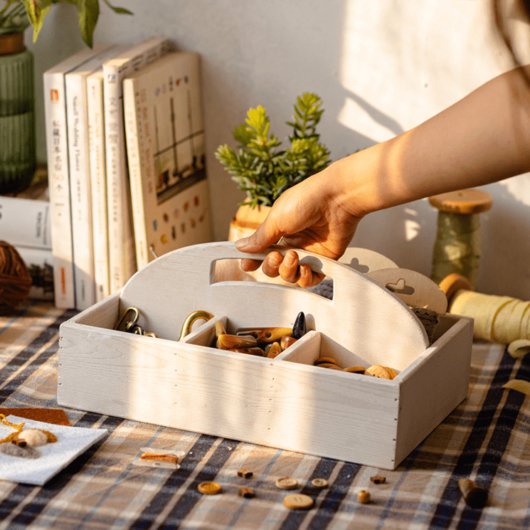 Solid wood caddy with divided compartments and a carry handle
