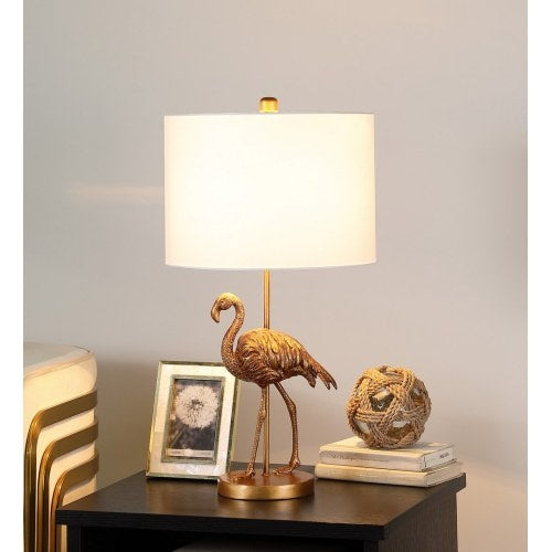 Matte gold flamingo table lamp with white drum shade