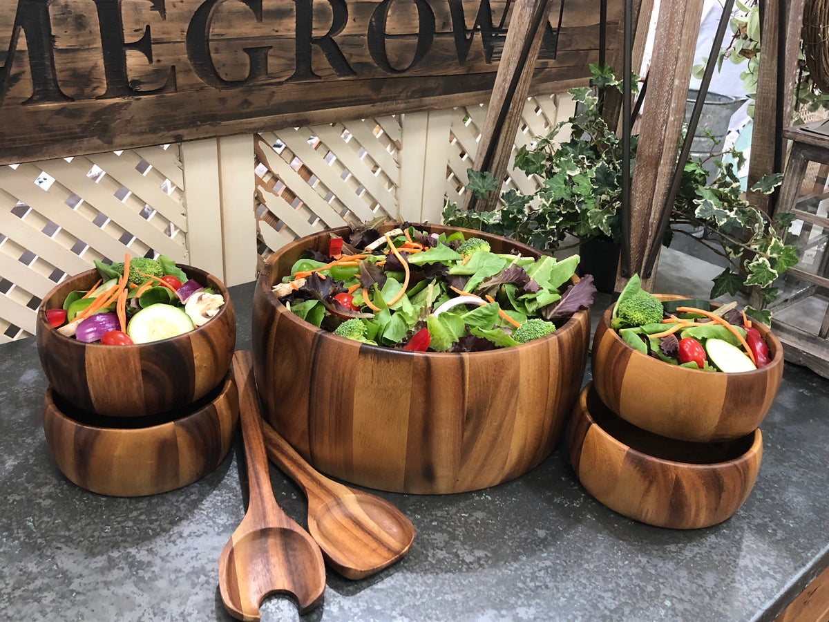 Dragor acacia salad bowl set on a dining table