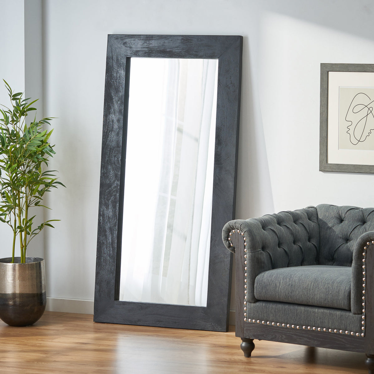 Full-length standing mirror in a solid mango wood frame